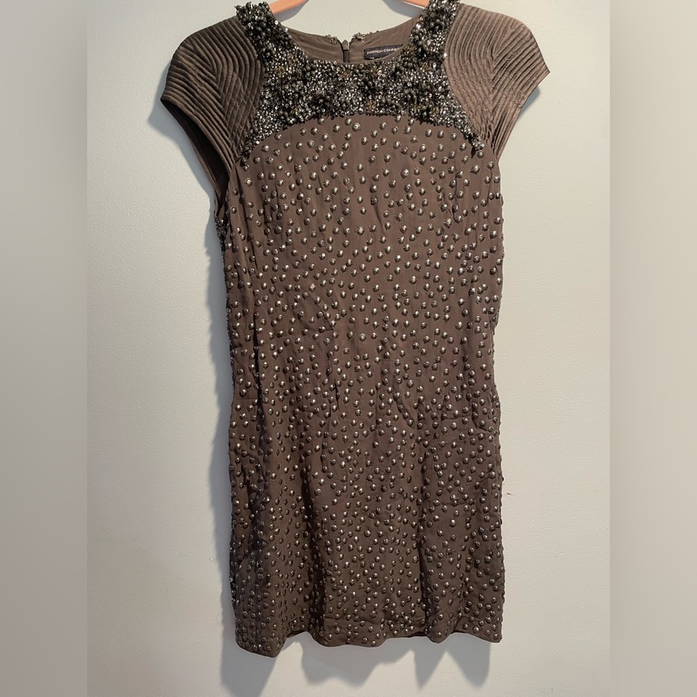 Shine and Sparkle in this gray French Connection dress perfect for a night out